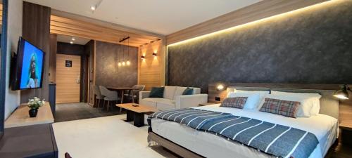 Luksuzne Woodside Kopaonik residences nude savremen smeštaj, planinske poglede, blizinu ski staza i potpuno opremljene apartmane za odmor.