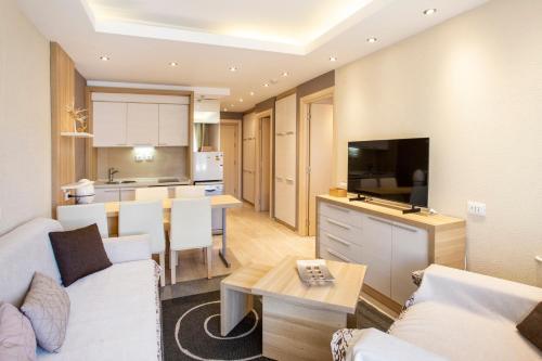 Kopaonik Konaci centar lux apartman na dan premium smeštaj u pešačkoj zoni skijališta