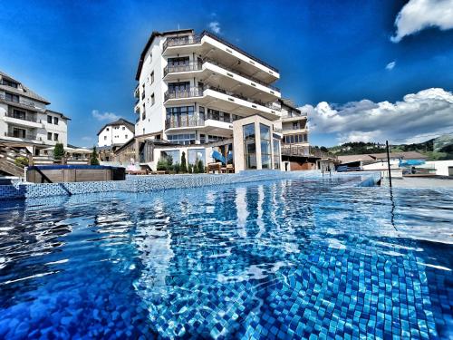 Milmari S70 Kopaonik Vikend naselje stan na dan smestaj kompleks sa bazenom spa centar